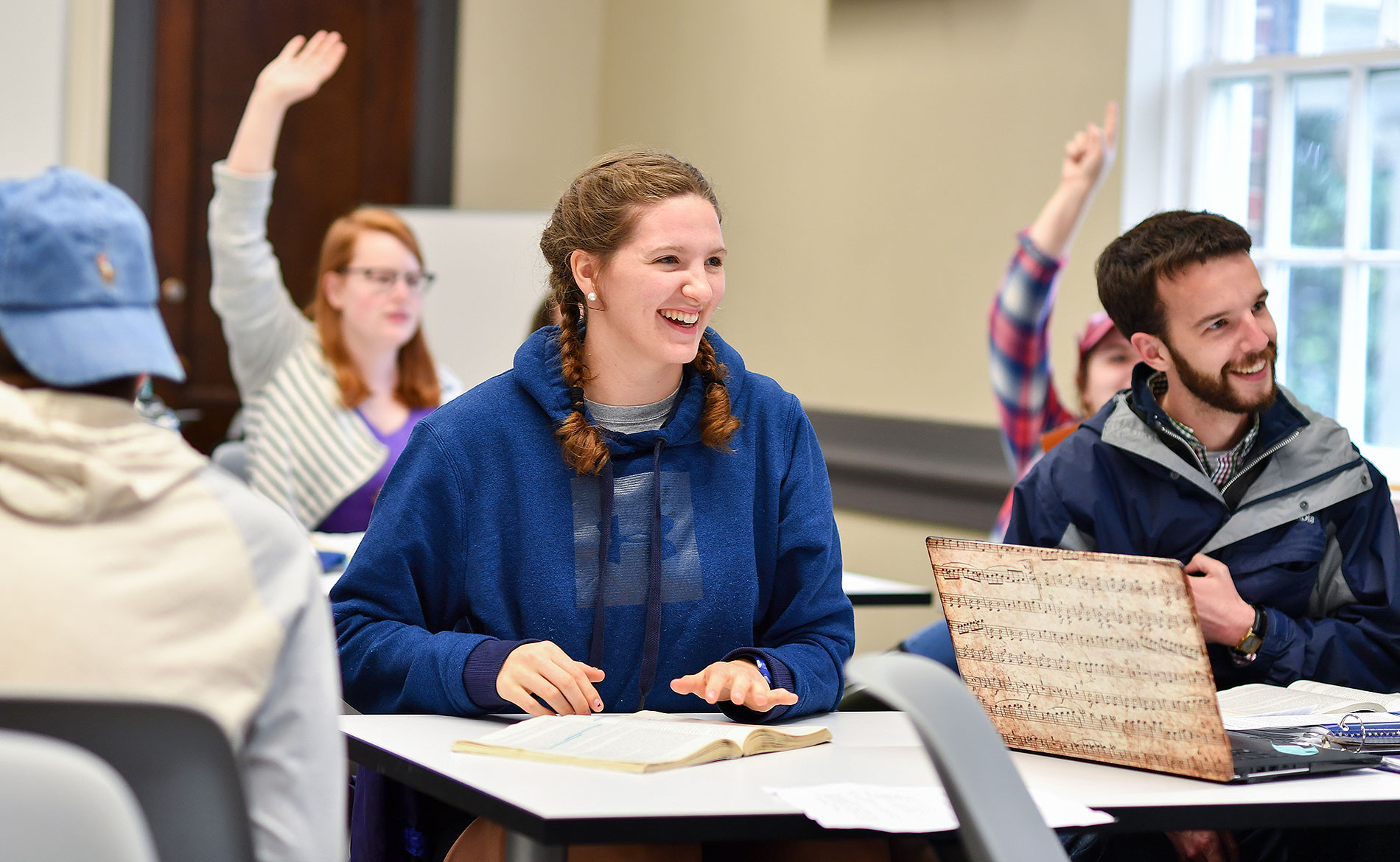 Smiling students in a lecture