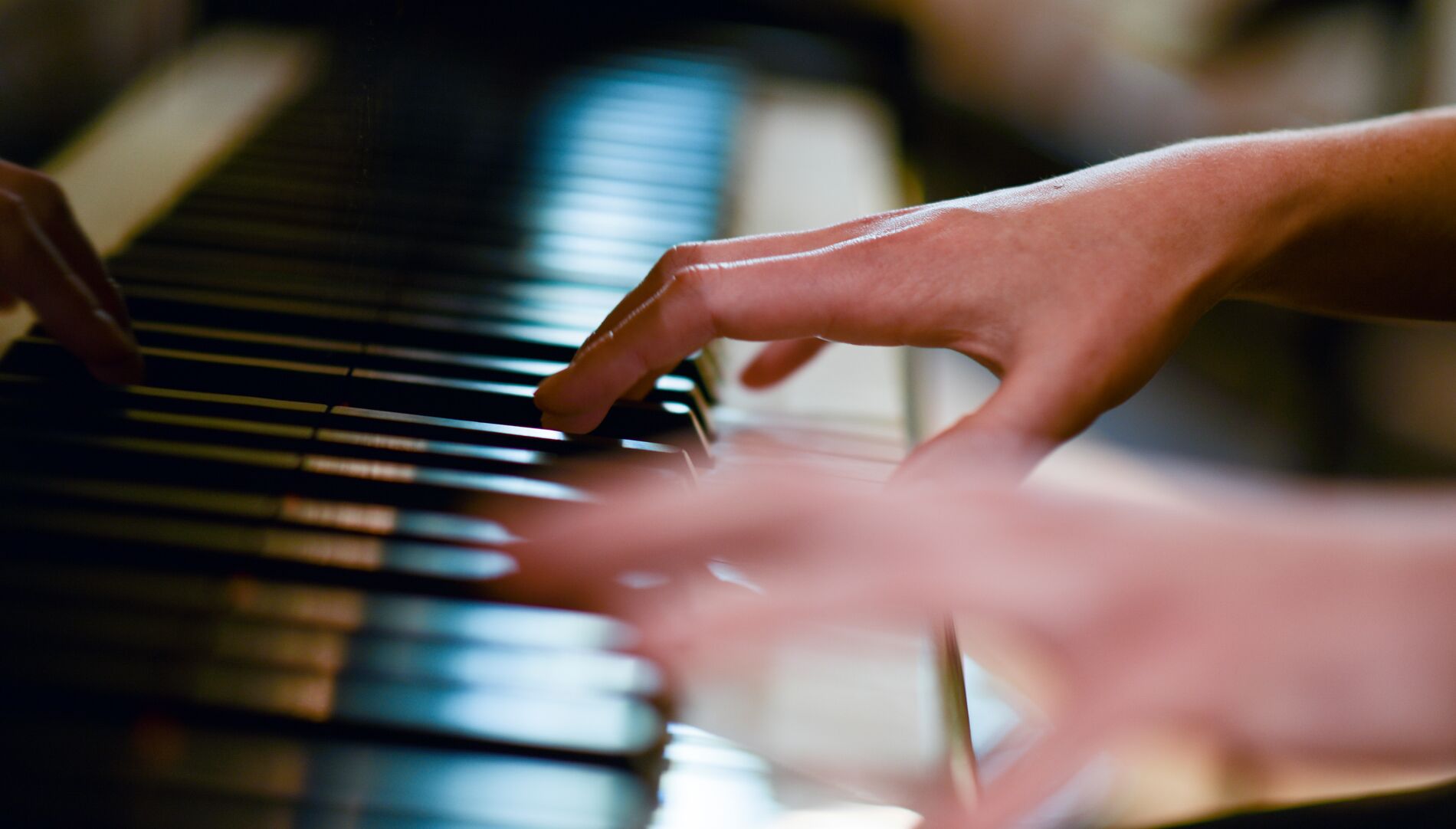 A woman playing the piano