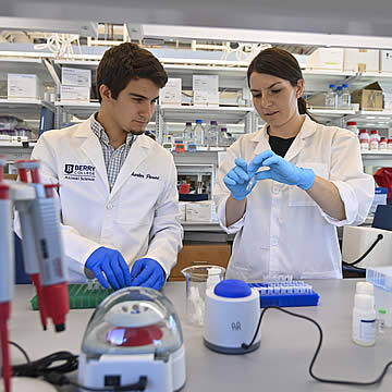 student reviewing materials with internship supervisor